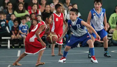 Niños triquis oaxaqueños, campeones del festival de basquetbol en Argentina.